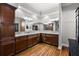 Spacious main bathroom with dual sinks, plenty of storage, and granite countertops at 4049 Nostalgia Ter, The Villages, FL 32163