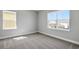 Bright bedroom with carpet and windows offering neighborhood views at 6208 Trailblaze Bnd, St Cloud, FL 34771