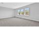 Bright bedroom with large windows offering a pleasant view at 6208 Trailblaze Bnd, St Cloud, FL 34771