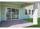 Covered patio with brick flooring and a lake view at 6208 Trailblaze Bnd, St Cloud, FL 34771
