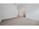 This bedroom features neutral carpeting, freshly painted walls, and a spacious closet for storage at 6608 Quest St, St Cloud, FL 34771