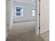 Bright bedroom featuring plush carpet and windows providing lots of natural light at 6608 Quest St, St Cloud, FL 34771