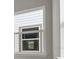 A close up of a window and exterior house siding at 6612 Quest St, St Cloud, FL 34771
