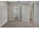 Open laundry room featuring gray cabinets, white countertops, and tiled flooring at 6616 Quest St, St Cloud, FL 34771