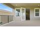 Spacious balcony with an entry to the living room at 15615 Vetta Dr, Montverde, FL 34756