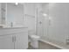 Modern bathroom with sleek vanity and glass-enclosed shower at 15615 Vetta Dr, Montverde, FL 34756
