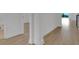 Bright hallway with beautiful flooring leading to additional living space at 15615 Vetta Dr, Montverde, FL 34756