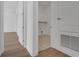 Bright laundry room featuring patterned flooring, cabinets, and utility connections at 15615 Vetta Dr, Montverde, FL 34756
