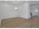 Bright living room with modern flooring and light fixture at 15615 Vetta Dr, Montverde, FL 34756