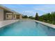 Large pool with jacuzzi in a big backyard perfect for outdoor enjoyment at 15615 Vetta Dr, Montverde, FL 34756