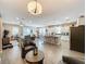 Open-concept living space with a kitchen, dining area, and comfortable living room at 518 Narrow View Ln, Groveland, FL 34736