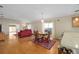 Bright dining area with seating for four and access to the kitchen at 547 Richburg St, The Villages, FL 32162