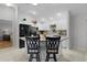 Kitchen with island and breakfast bar seating at 8194 Se 177Th Winterthur Loop, The Villages, FL 32162