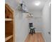 Walk-in closet offering ample storage with shelving and organization solutions at 8194 Se 177Th Winterthur Loop, The Villages, FL 32162