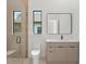 Bright bathroom features frameless shower, floating vanity, and modern fixtures at 16909 Crete Way, Bella Collina, FL 34756