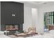 Close up of the living room's modern fireplace and decorative accents at 16909 Crete Way, Bella Collina, FL 34756
