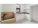 Bright mud room features dog wash station, white cabinetry and a large window for natural light at 16909 Crete Way, Bella Collina, FL 34756