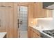 This butler's pantry is spacious, offering ample storage with floor to ceiling shelving in a modern kitchen at 16909 Crete Way, Bella Collina, FL 34756