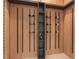 A custom wine cellar with sleek shelving and ample storage for wine bottles at 16909 Crete Way, Bella Collina, FL 34756