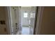 Clean bathroom with shower/tub combo and exterior access at 7807 Rollingridge Ct, Orlando, FL 32835