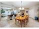 Open concept kitchen and dining room with tile floors and lots of natural light at 4088 Kingsley St, Clermont, FL 34711