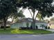 Charming single-story home with a two-car garage and a beautifully landscaped front yard at 4088 Kingsley St, Clermont, FL 34711