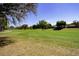 Lush green golf course with mature trees, offering a scenic and tranquil environment for residents to enjoy at 4088 Kingsley St, Clermont, FL 34711