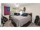 Casual bedroom featuring ceiling fan, window, and comfortable bed at 5279 Bowline Ct, Oxford, FL 34484