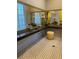 Well-appointed community bathroom with granite vanity at 119 Crescent Moon Dr, Groveland, FL 34736