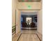 Bright and spacious community hallway with seating area at 119 Crescent Moon Dr, Groveland, FL 34736