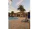 Resort-style pool with lounge chairs at 119 Crescent Moon Dr, Groveland, FL 34736