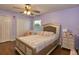 Comfortable bedroom with ample closet space and soft natural light at 13412 Fox Glove St, Winter Garden, FL 34787