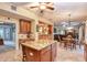 Spacious kitchen with granite countertops, central island, and stainless steel appliances at 13412 Fox Glove St, Winter Garden, FL 34787