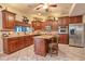 Well-equipped kitchen featuring ample cabinetry, stainless steel appliances, and a center island at 13412 Fox Glove St, Winter Garden, FL 34787