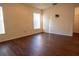 Bedroom featuring wood floors, neutral walls, and window with blinds at 1836 Ridge Valley St, Clermont, FL 34711