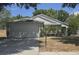 Charming single-story home with a two-car garage, well-maintained landscaping, and a classic design at 1836 Ridge Valley St, Clermont, FL 34711
