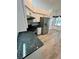 Modern kitchen boasting granite counters, updated stainless steel appliances, and stylish white cabinetry at 24124 Robinwood St, Leesburg, FL 34748