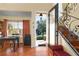 Foyer with decorative staircase and terracotta tile at 1405 Hilltop Dr, Mount Dora, FL 32757