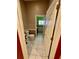 Bathroom with white toilet, vanity, and bright green paint on the wall outside of the room at 3721 Plantation Blvd, Leesburg, FL 34748