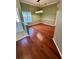 Dining Room with hardwood floors, decorative chair rail and green walls at 3721 Plantation Blvd, Leesburg, FL 34748