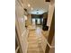 Spacious kitchen features granite counters, white cabinets, and a view of the dining room at 3721 Plantation Blvd, Leesburg, FL 34748