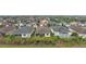 Aerial view of houses and community landscape at 8724 Bridgeport Bay Cir, Mount Dora, FL 32757