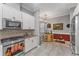 Modern kitchen with stainless steel appliances and tile backsplash at 8724 Bridgeport Bay Cir, Mount Dora, FL 32757