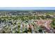 Aerial view of property indicates location within a golf course and residential neighborhood at 956 Chula Ct, The Villages, FL 32159