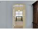 Dining room with a table, window with blinds, and light fixture at 956 Chula Ct, The Villages, FL 32159