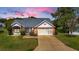 Charming single-story home features a well-manicured lawn and inviting curb appeal at 956 Chula Ct, The Villages, FL 32159