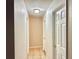 Hallway featuring ceramic tile floor and a light fixture on the ceiling at 2059 Newtown Rd, Groveland, FL 34736