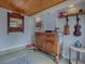 Bonus room featuring wood ceiling, yoga mats, and built-in cabinet with unique decorative elements at 351 W 10Th Ave, Mount Dora, FL 32757