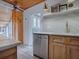 Kitchen featuring stainless steel appliances, custom cabinets, marble countertops, and stylish lighting at 351 W 10Th Ave, Mount Dora, FL 32757