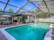 This gorgeous pool is surrounded by a screened enclosure and ample seating areas at 351 W 10Th Ave, Mount Dora, FL 32757